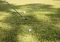 Golfschlaeger_und_Ball_Golftrophy_intern